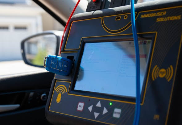 Different types of replacement car keys including remote and transponder keys